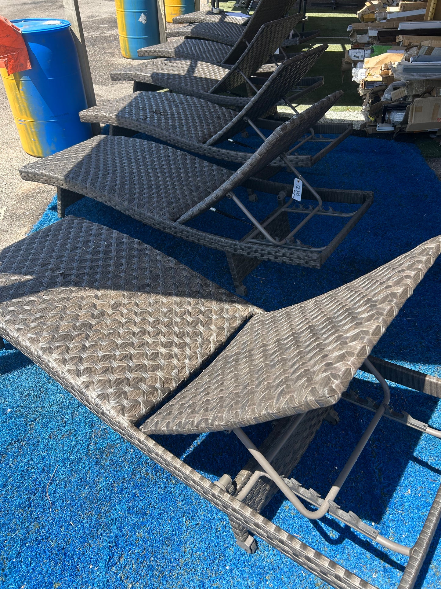 Brown, folding wicker outdoor lounge chairs 