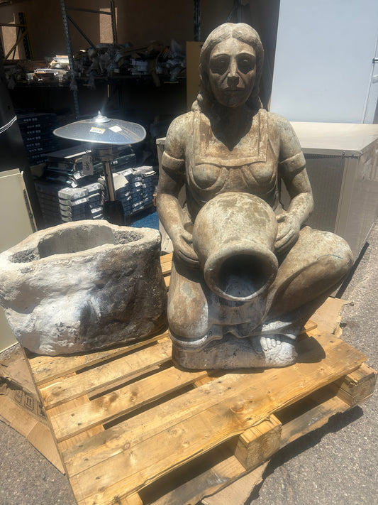 Stone statue of native woman with pitcher water fountain ￼