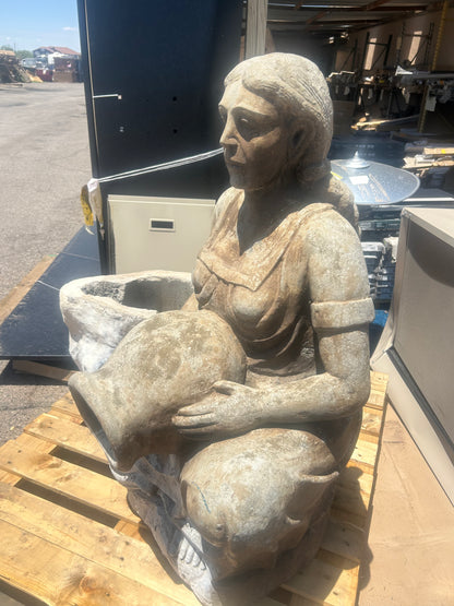Stone statue of native woman with pitcher water fountain ￼