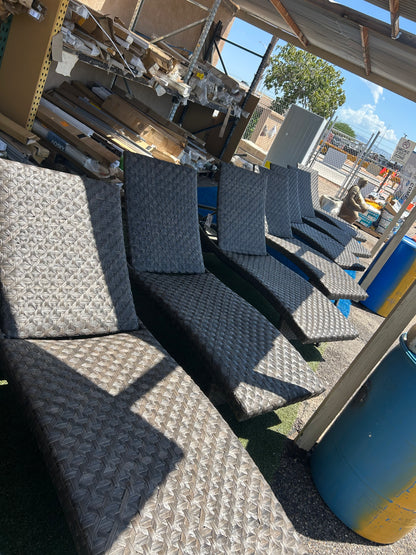 Brown, folding wicker outdoor lounge chairs ￼