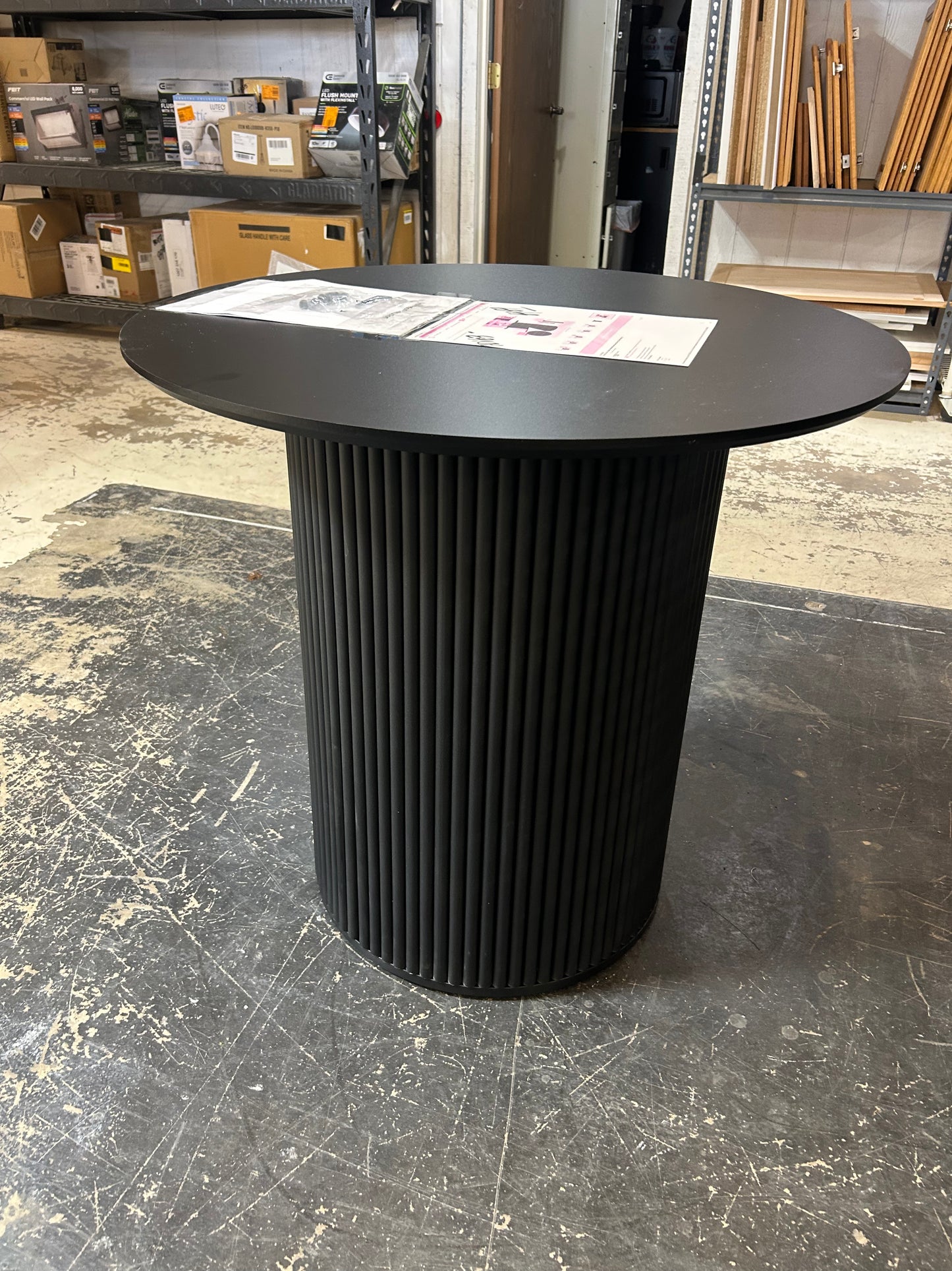 Wood, black pedestal base round dining table ￼