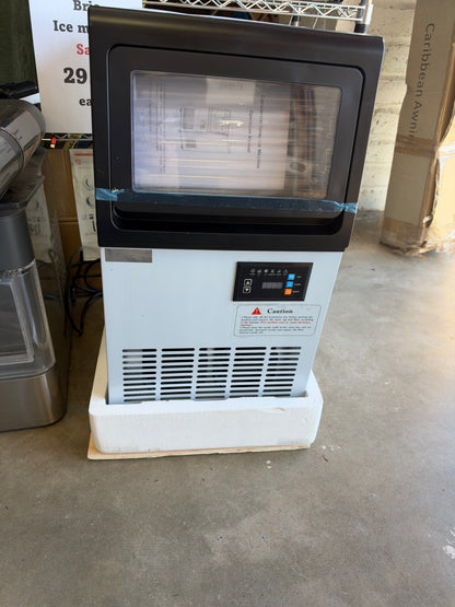 Freezer standing ice maker
