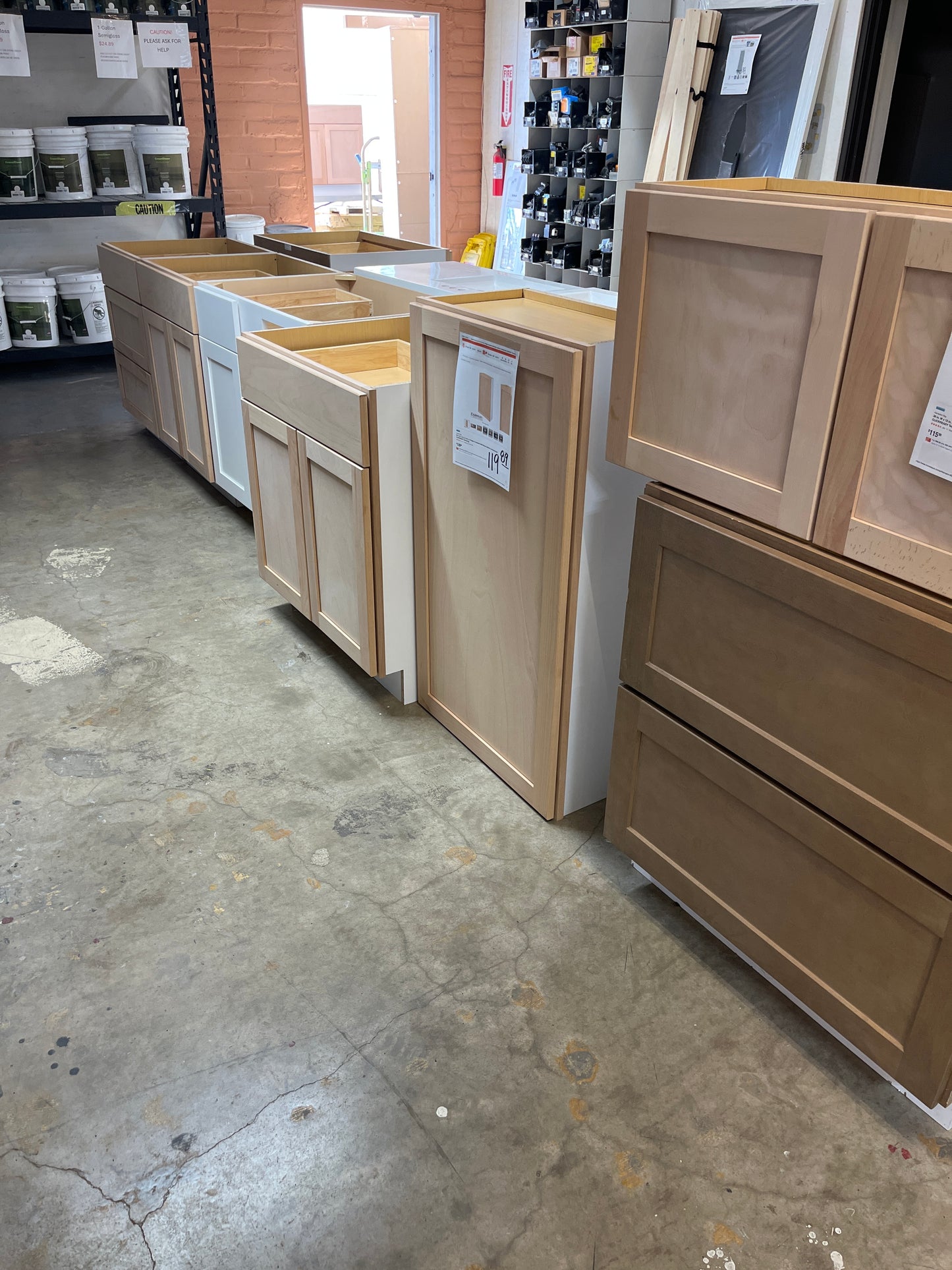 Lots of shaker unfinished birch cabinets