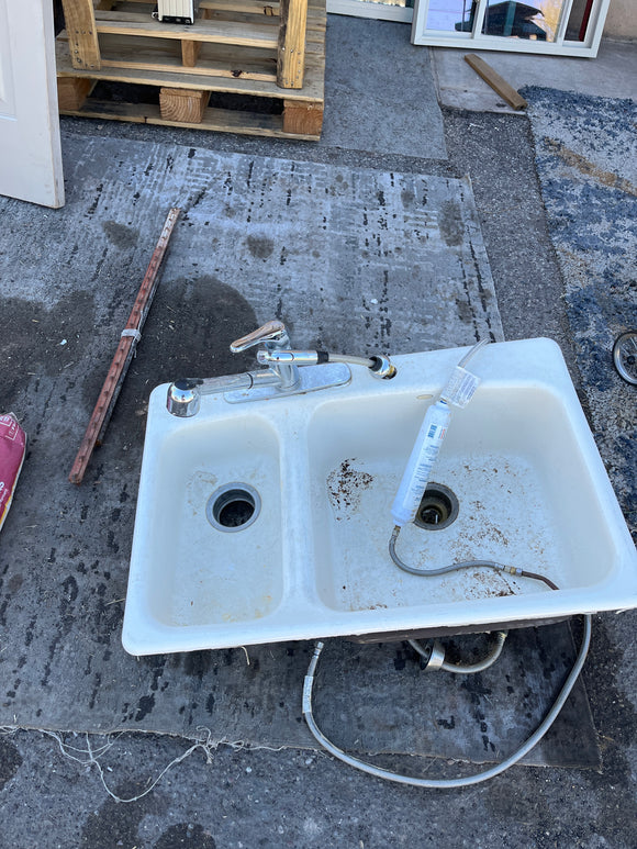 Double bowl sink with faucet