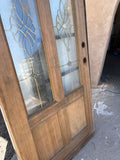 Brass, glass, and wood front door