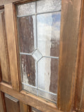 Solid wood front door with leaded glass