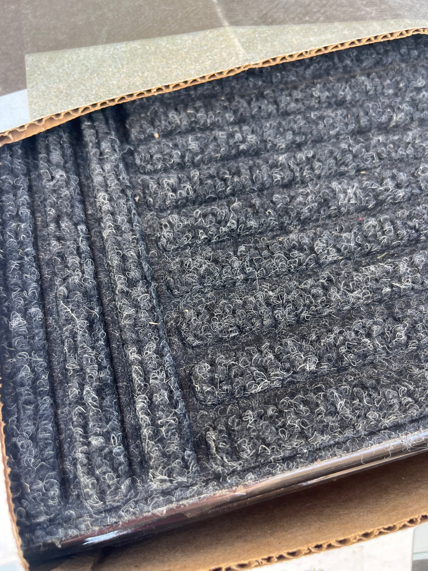 Carpeted heavy duty floor tiles