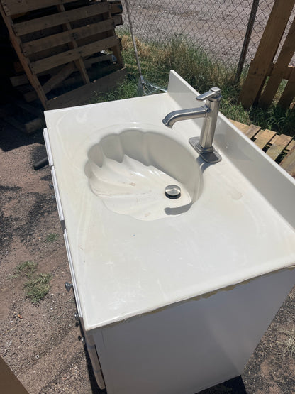 Beautiful oyster shell topped vanity