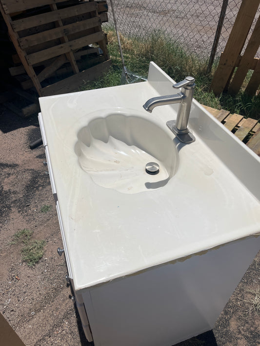Beautiful oyster shell topped vanity