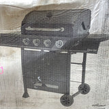 Dyna-Glo four burner LP gas grill with seer plus